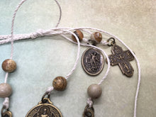 Load image into Gallery viewer, St. Benedict Home blessing cord, white w bronze finish
