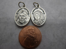 Load image into Gallery viewer, Sts. Francisco (1908-1919) &amp; Jacinta Marto silver oxide holy medal
