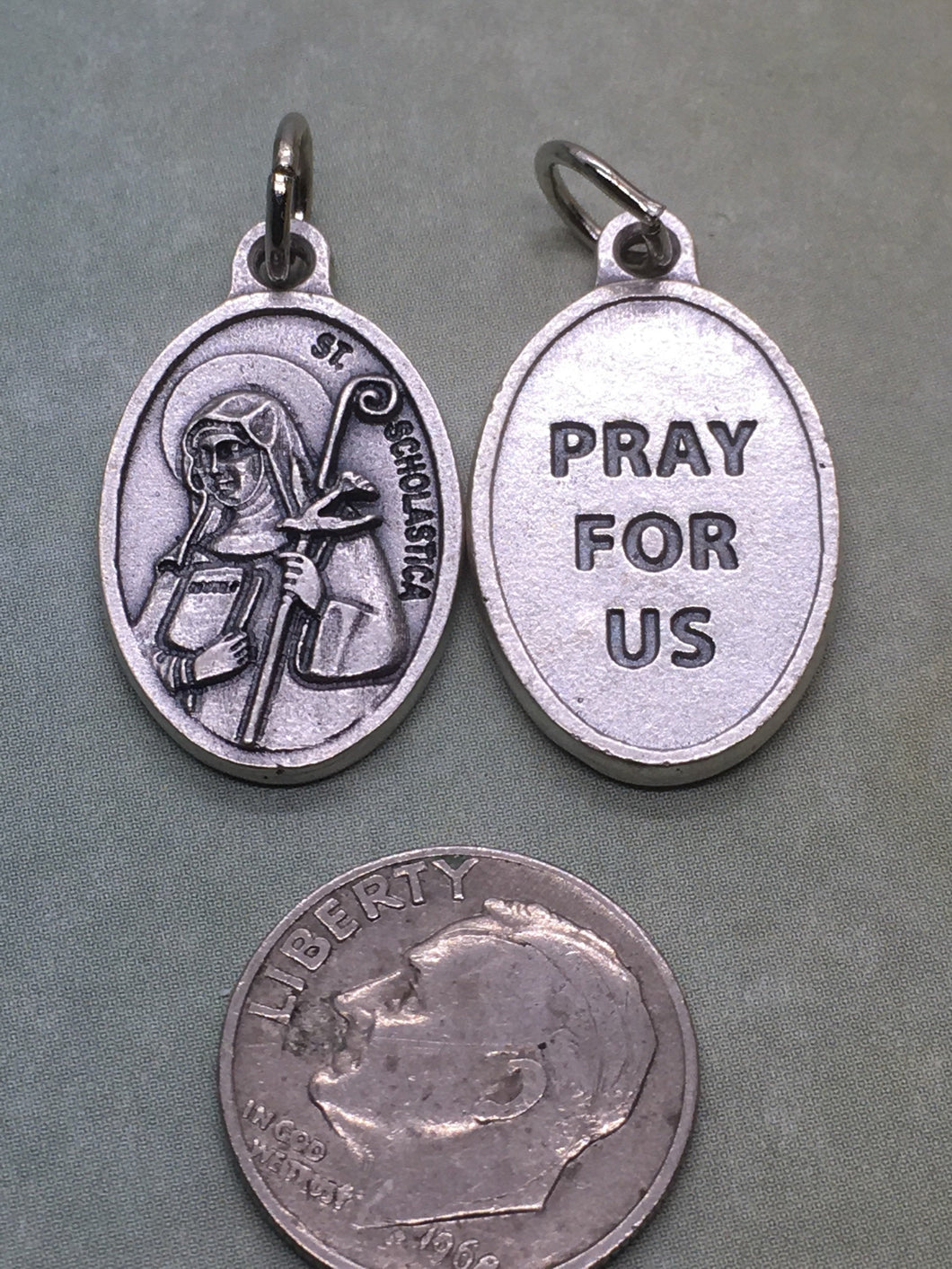 St. Scholastica holy medal - patron saint against lightning and storms. Catholic. religious.